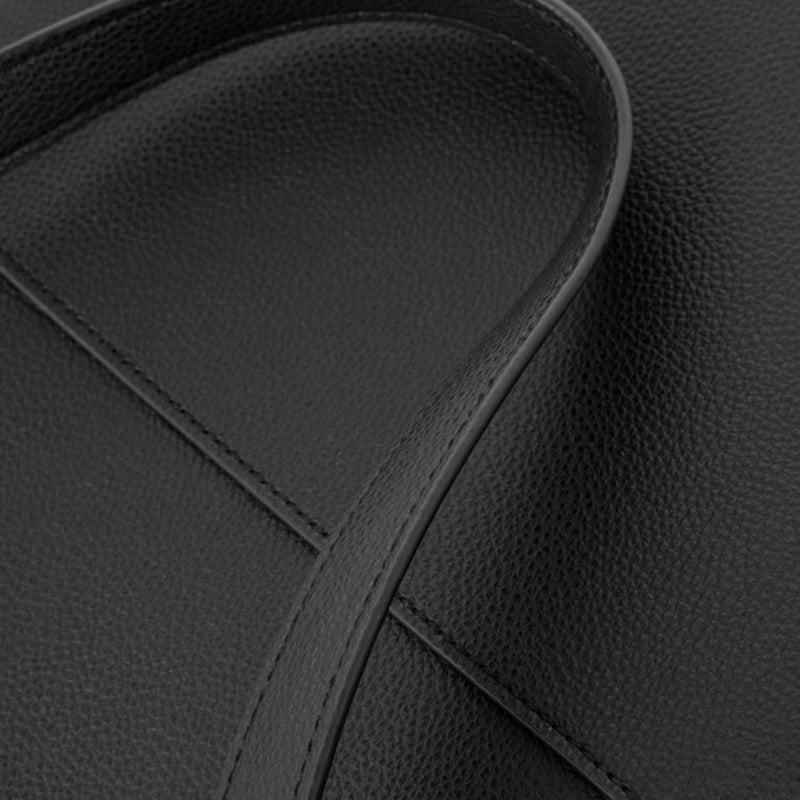 Soft faux leather tote bag with trendy ring-shaped hardware